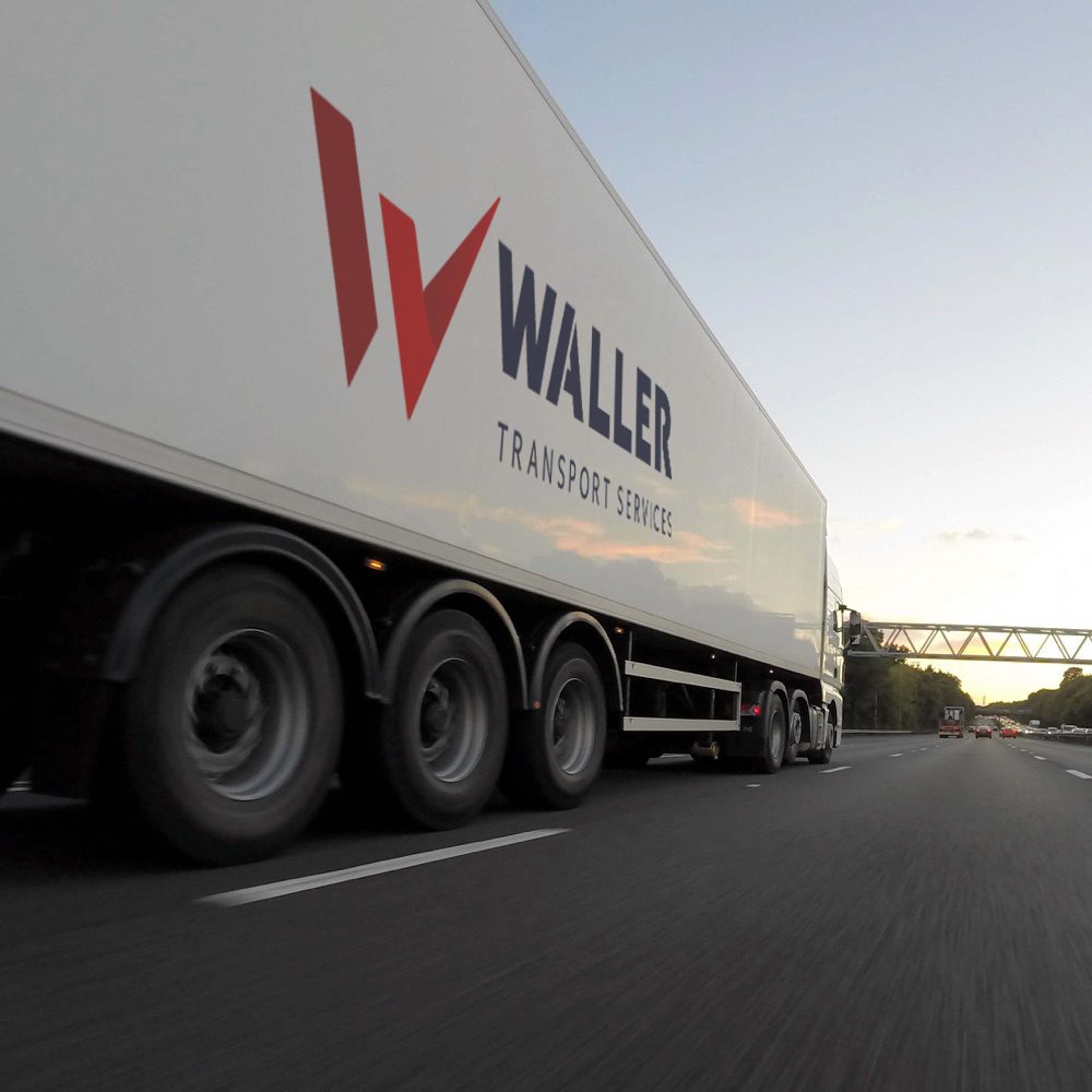 Photo of a Waller Transport vehicle, showing the Waller logo.